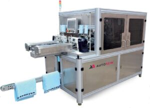 Машина для поперечного раскроя, подгибки и вставки этикетки Autosew FTTS-500