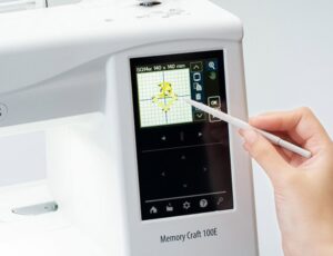 Вышивальная машина Janome Memory Craft 100E Turquoise Blue